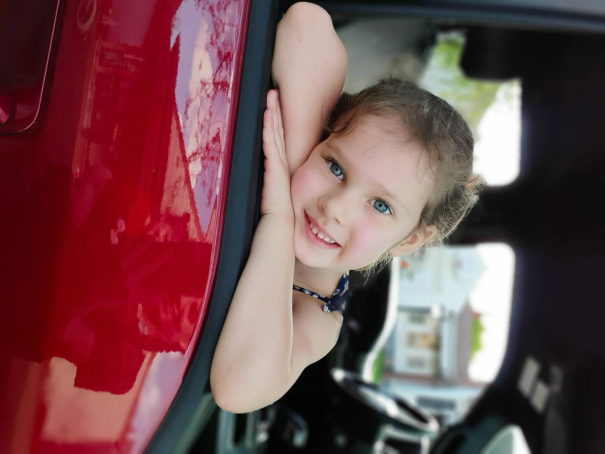 Shiloh is registered to the contest to win money with this photo: auto_part, automotive_window_part, beauty, black_hair, car, child, child_model, eye, face, family_car, joy, lip, person, photography, red, smile, toddler, vehicle, vehicle_door, window