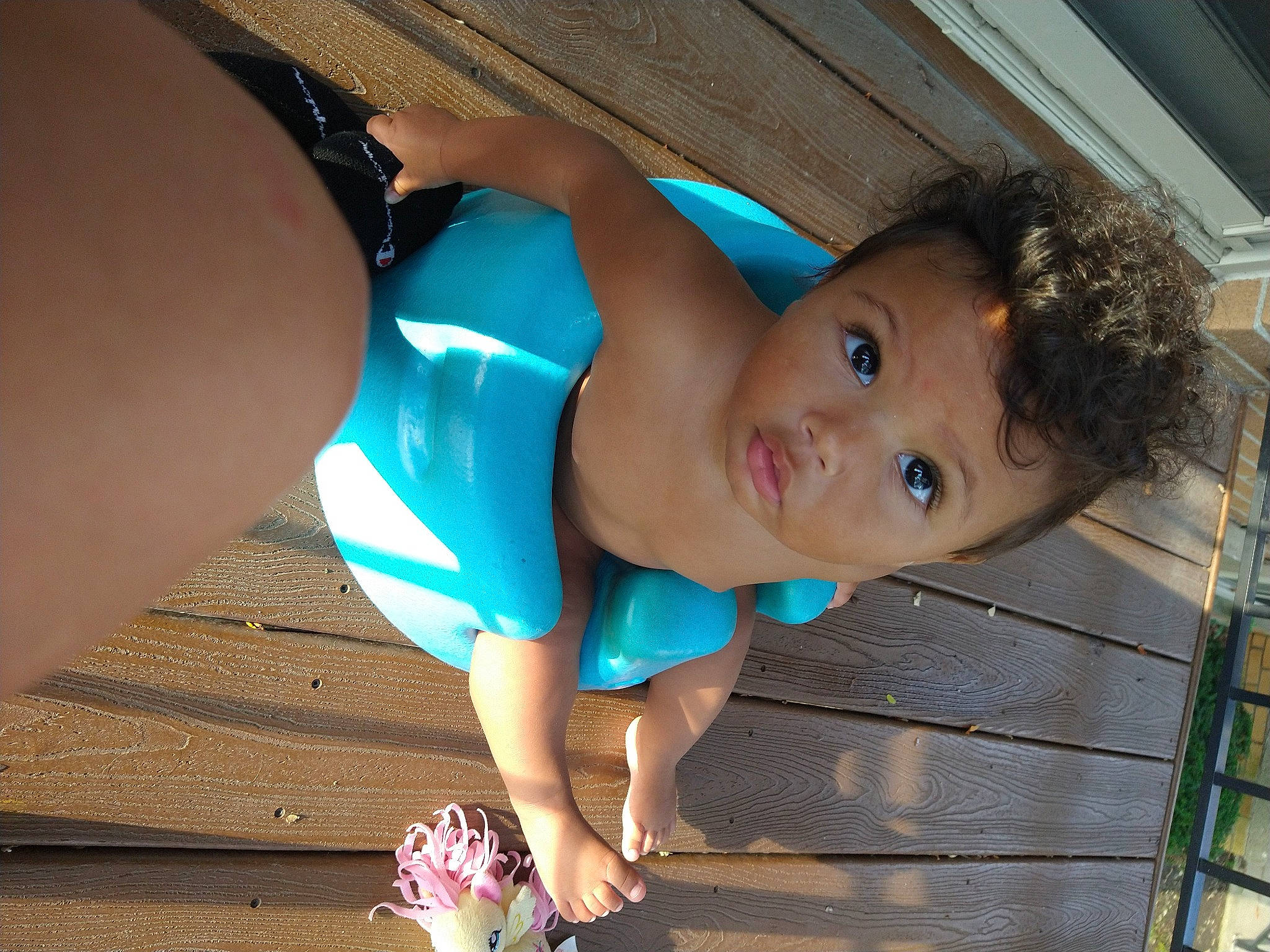 Milliana is registered to the contest to win money with this photo: azure, baby, baby_toddler_clothing, beauty, elbow, electric_blue, eye, finger, flooring, foot, fun, happy, human_leg, joint, leisure, organ, person, skin, thigh, toddler