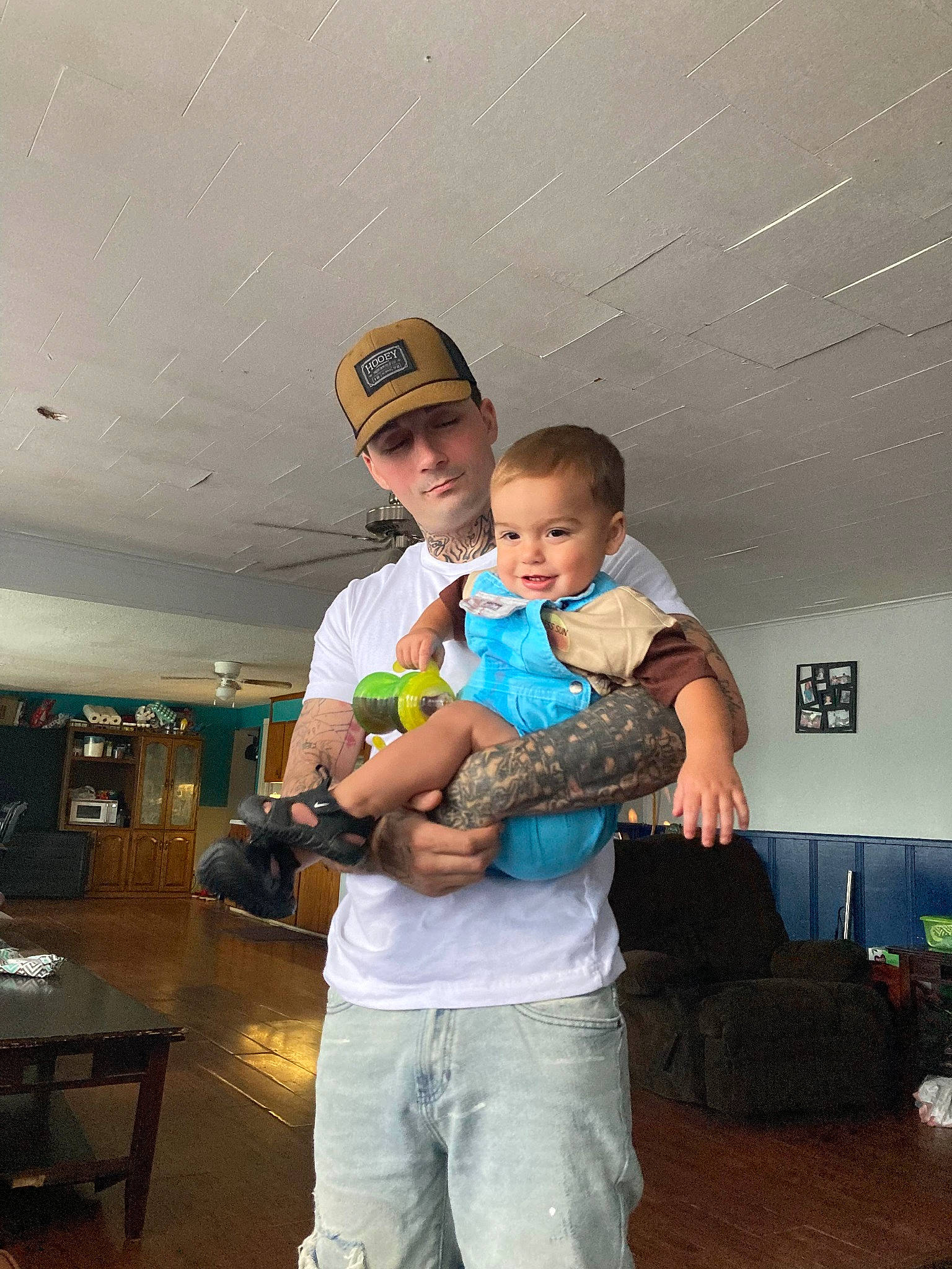 Jason joined the competition — help win amazing prizes! abdomen, baby, baseball_cap, child, event, fun, happy, hat, headwear, houseplant, joy, leisure, luggage_and_bags, person, room, shorts, sitting, sun_hat, t_shirt, toddler