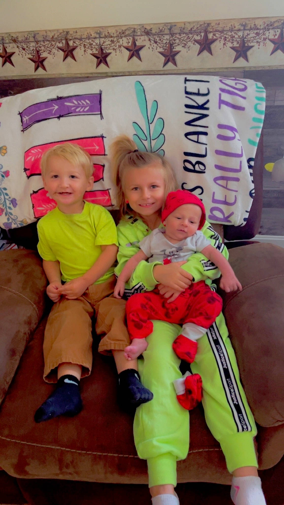 Waylon joined the competition — help win amazing prizes! baby, baby_toddler_clothing, child, event, face, facial_expression, fun, happy, hat, headwear, holiday, joy, lap, leisure, logo, person, pink, product, shorts, sitting