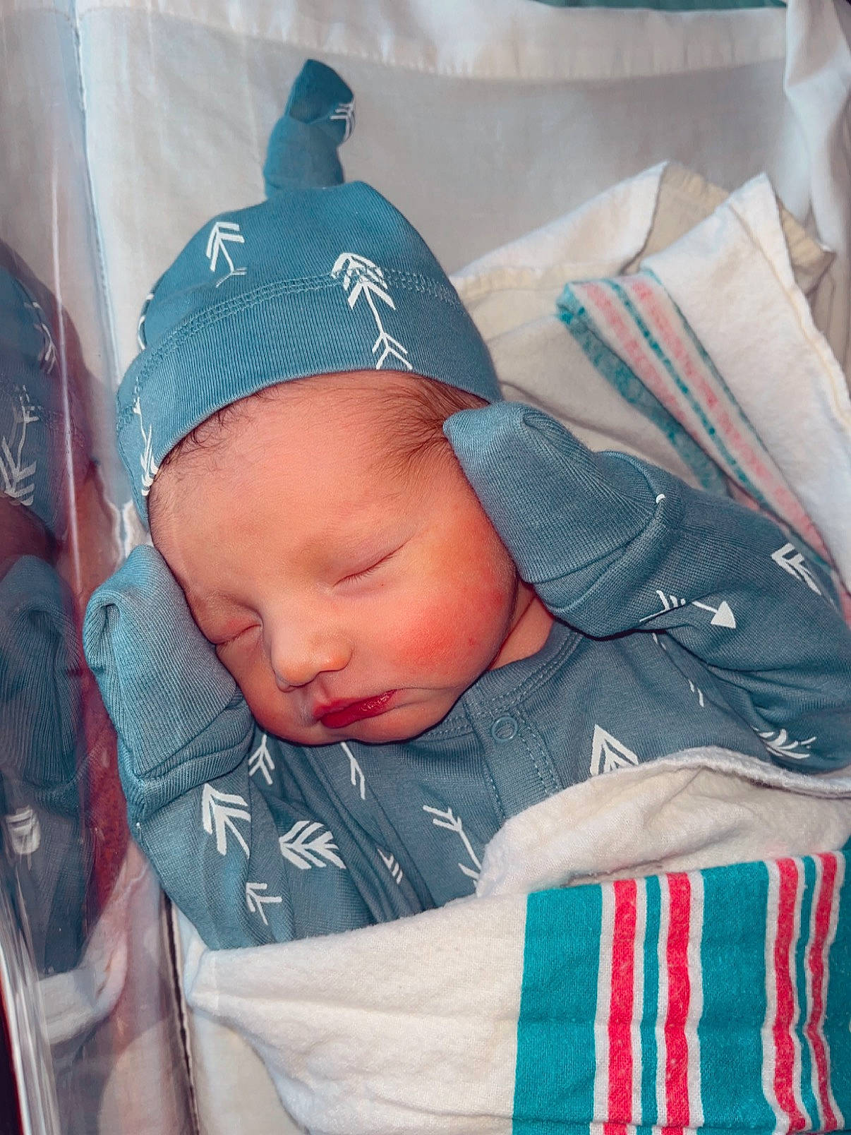 Brody is registered to the contest to win money with this photo: baby, baby_carriage, baby_in_car_seat, baby_products, baby_safety, baby_sleeping, baby_toddler_clothing, baseball_cap, cap, car_seat, carmine, child, comfort, electric_blue, hat, infant_bed, linens, pattern, person, sleeve