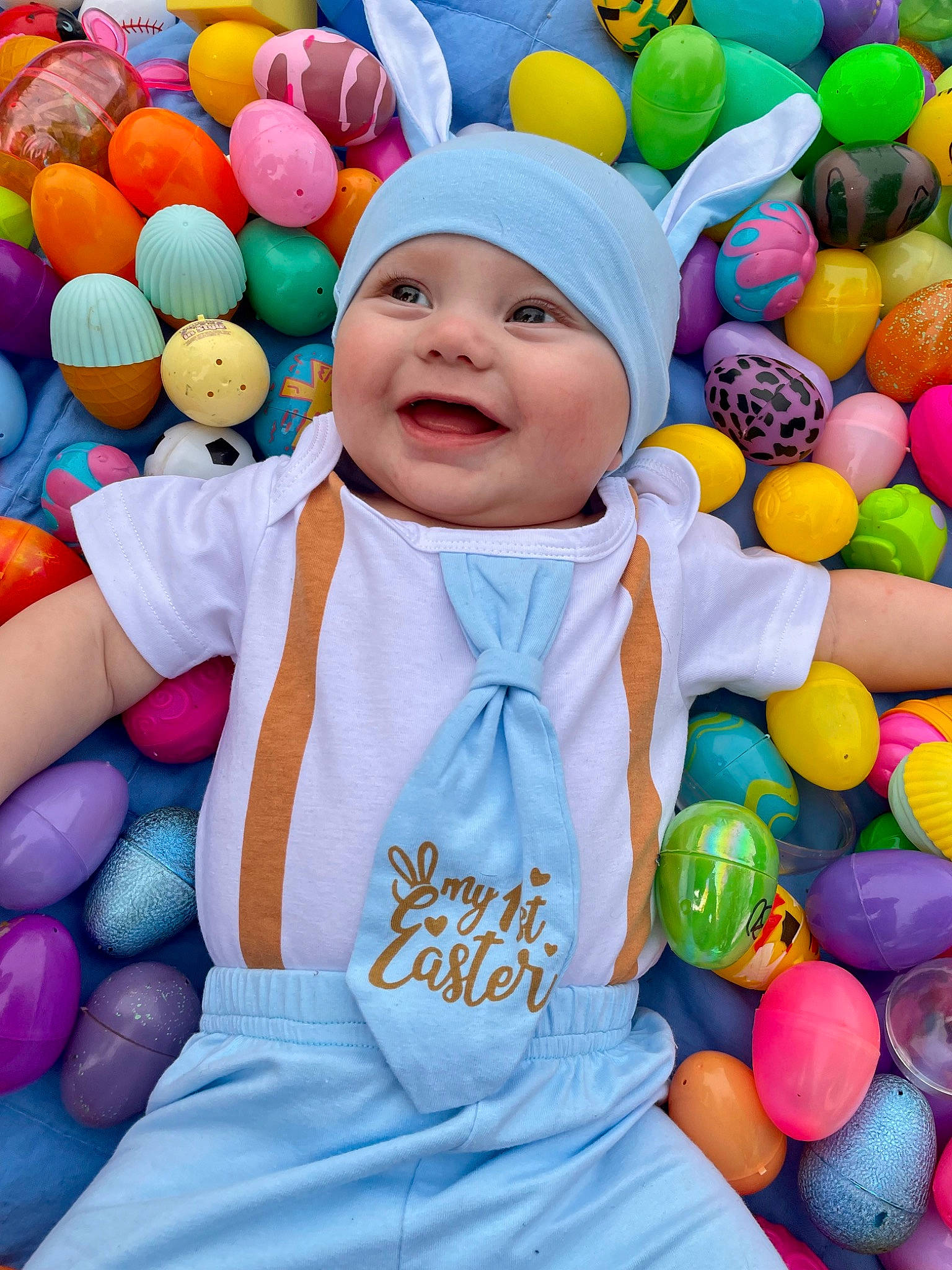 Dakota is registered to the contest to win money with this photo: baby, baby_toddler_clothing, ball, ball_pit, child, event, face, facial_expression, fun, happy, headwear, joy, leisure, party_supply, people, person, photograph, play, recreation, smile