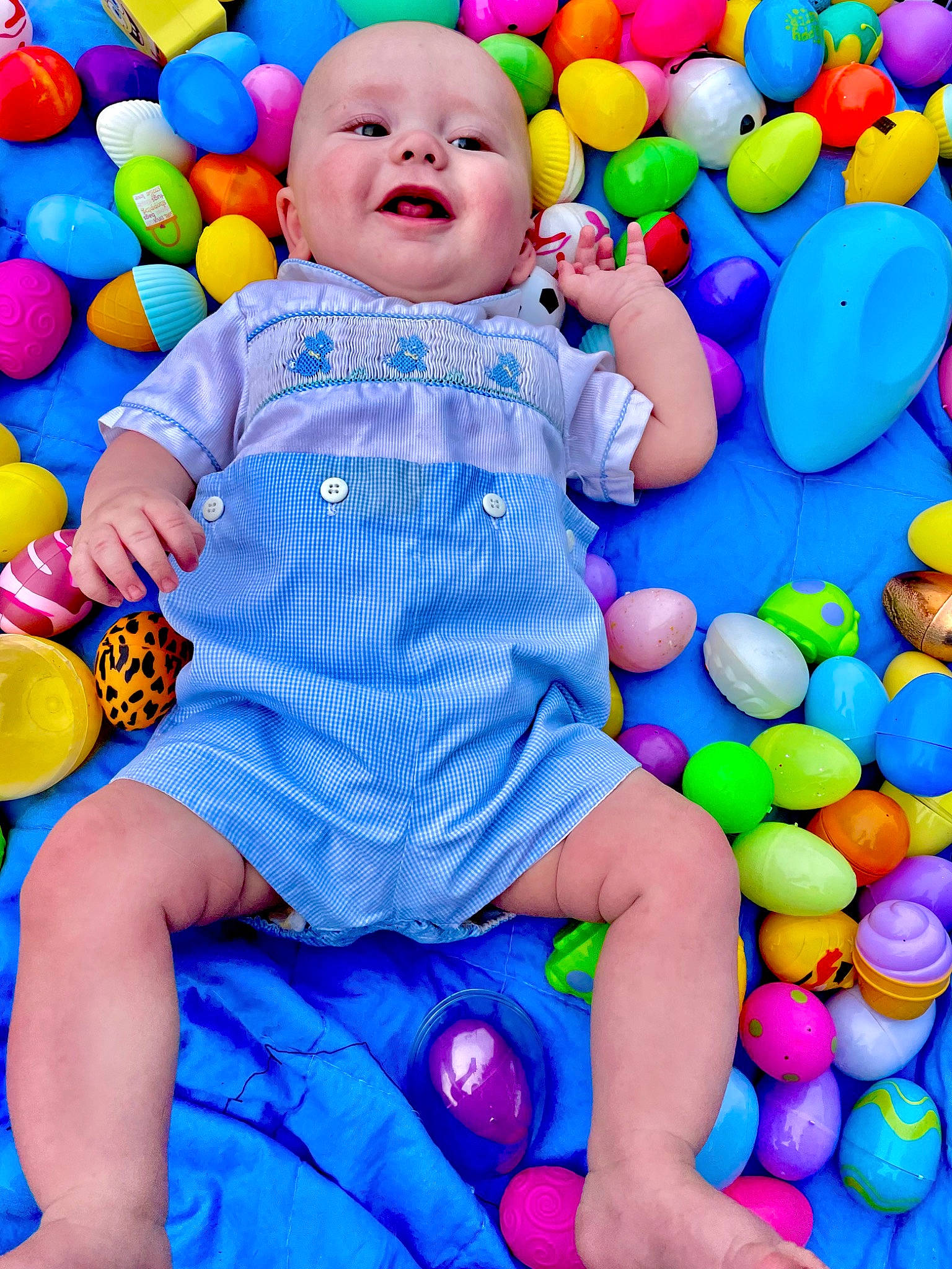 Dakota is registered to the contest to win money with this photo: baby, baby_playing_with_toys, baby_toddler_clothing, ball_pit, beauty, blue, child, electric_blue, facial_expression, fun, happy, leisure, people, person, photograph, product, sleeve, smile, snapshot, toddler
