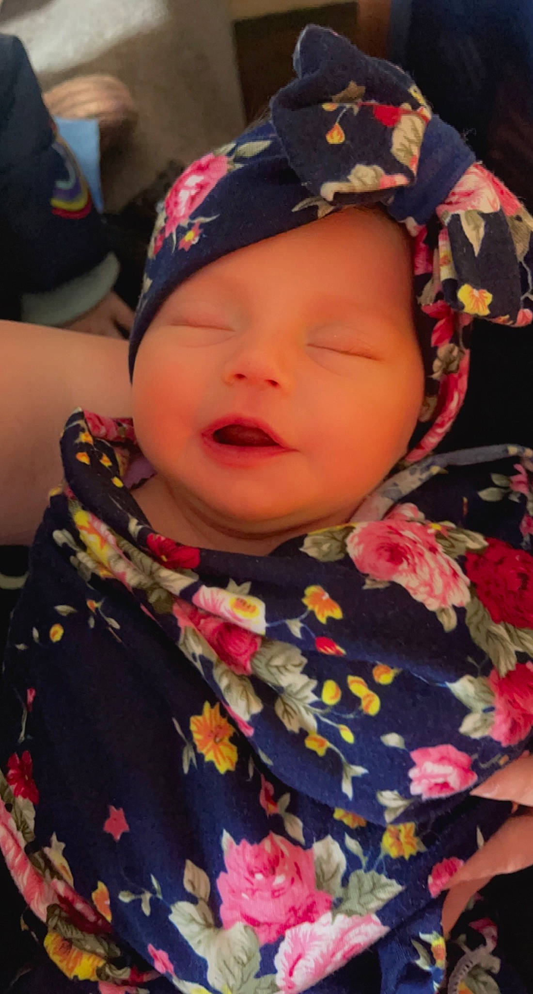 Abby is registered to the contest to win money with this photo: baby, cap, cheek, chin, eyebrow, headgear, headwear, knit_cap, lip, military_camouflage, mouth, nose, organ, outerwear, pattern, person, pink, skin, smile, textile