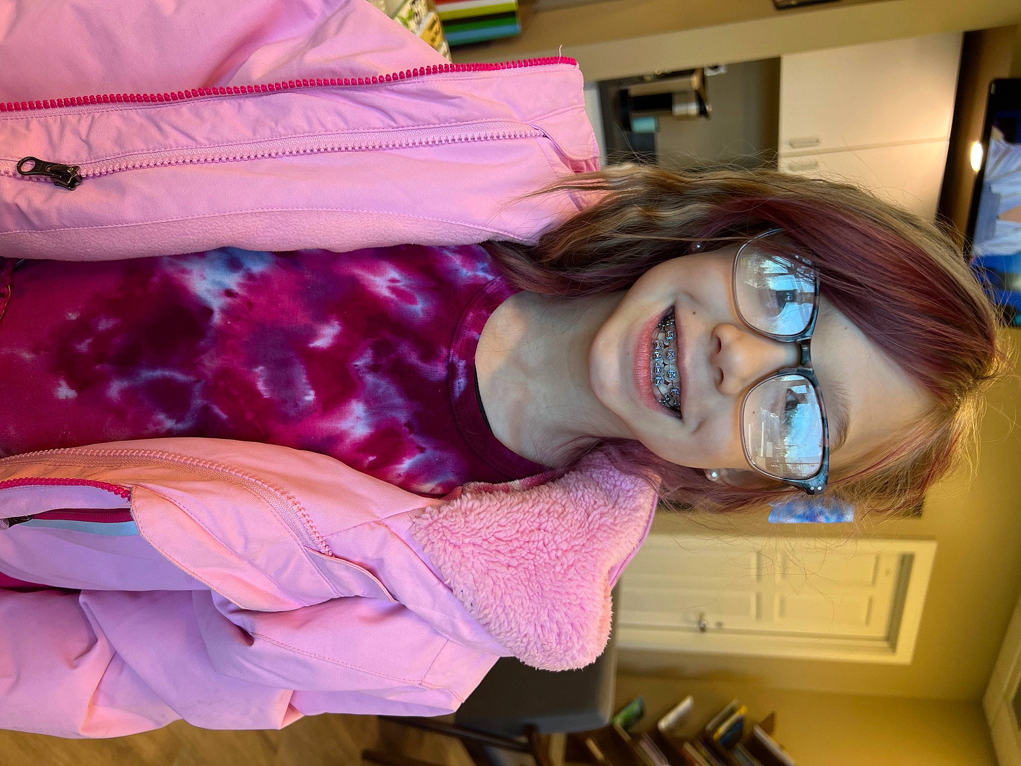 Oliveah is registered to the contest to win money with this photo: beauty, child, comfort, eyewear, fun, happy, jewellery, joy, laugh, linens, magenta, pattern, person, pink, purple, room, smile, vision_care, white