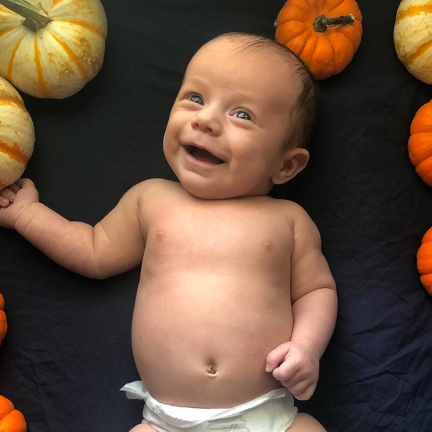 Mason joined the competition — help win amazing prizes! black, calabaza, cucurbita, eye, facial_expression, finger, gesture, happy, head, human_body, mouth, muscle, natural_foods, orange, organ, person, plant, pumpkin, smile, squash