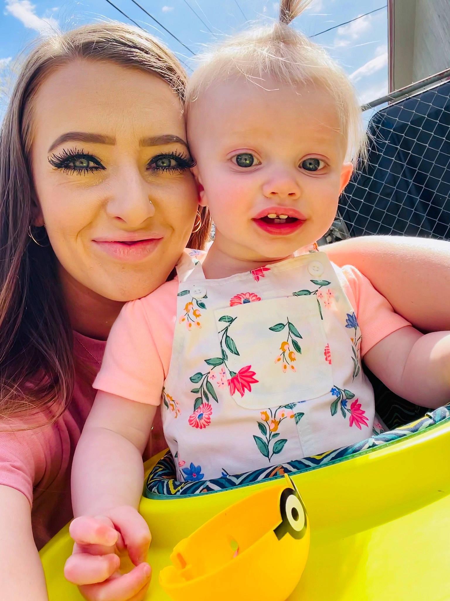 Adriana is registered to the contest to win money with this photo: azure, baby_toddler_clothing, blue, cheek, child, facial_expression, fun, gesture, hairstyle, happy, iris, joy, leisure, people_in_nature, person, pink, product, skin, smile, summer