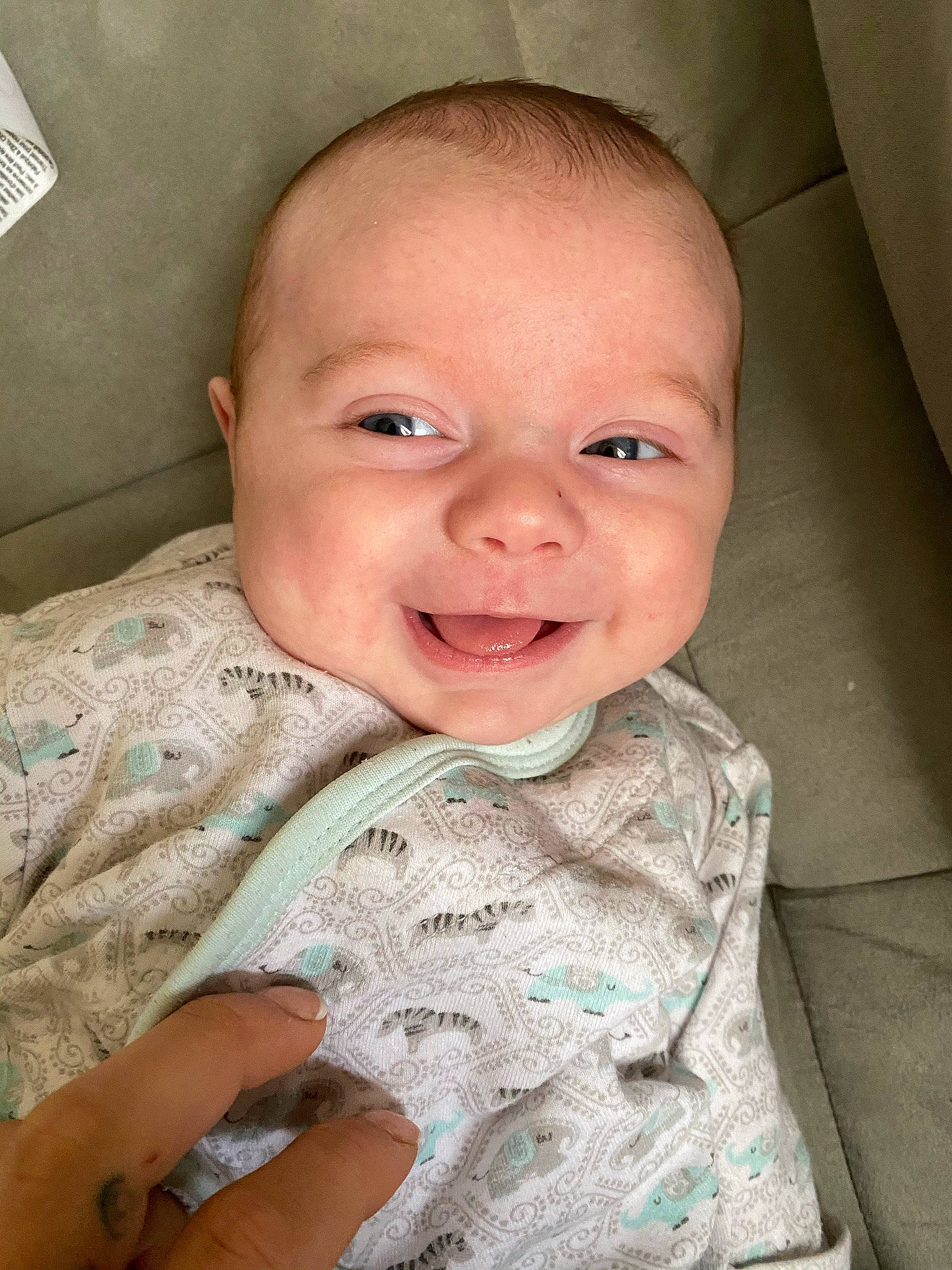 Boston is registered to the contest to win money with this photo: baby_toddler_clothing, cheek, child, chin, ear, eyebrow, finger, forehead, happy, iris, jaw, joy, laugh, lip, nail, nose, person, skin, sleeve, thumb