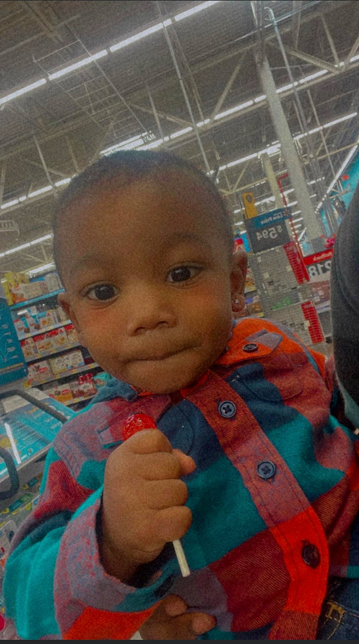 Jakari joined the competition — help win amazing prizes! baby, bookcase, cheek, child, forehead, fun, gesture, happy, iris, leisure, mouth, nose, organ, pattern, person, shelf, skin, t_shirt, temple, thumb