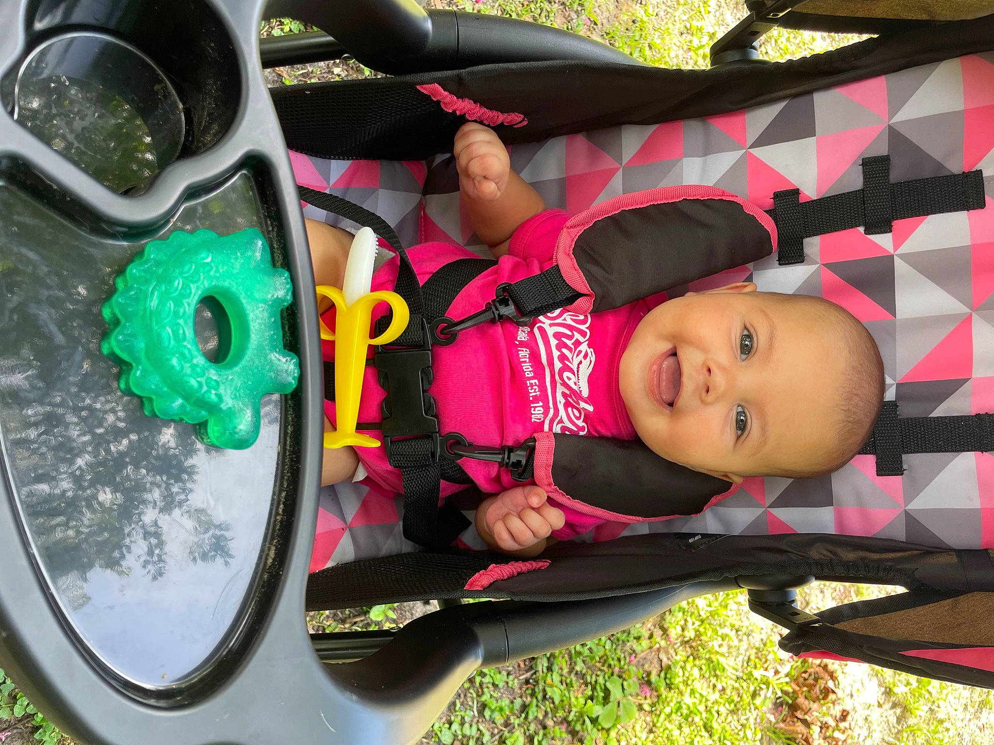 Sabrina joined the competition — help win amazing prizes! auto_part, automotive_design, automotive_exterior, automotive_tire, child, fun, green, leisure, motor_vehicle, person, plant, recreation, rim, shoe, smile, sneakers, tire, toddler, tree, vehicle