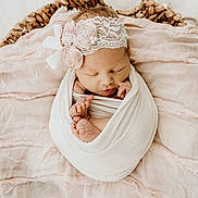 Keira is registered to the contest to win money with this photo: child, hair_accessory, headgear, headpiece, infant