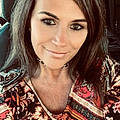 Trinia J.