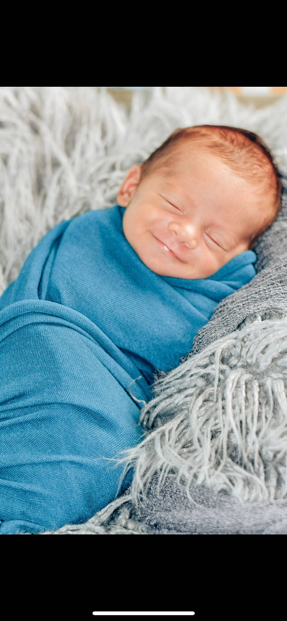 Syris is registered to the contest to win money with this photo: azure, baby, baby_toddler_clothing, bedtime, child, comfort, electric_blue, fur, grass, grey, happy, linens, people_in_nature, person, portrait_photography, skin, smile, textile, toddler, wool