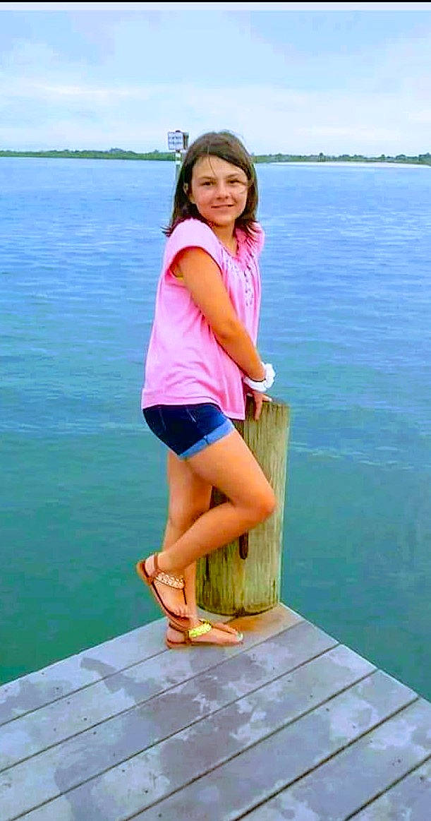 Mariah Ann is registered to the contest to win money with this photo: fun, human_leg, joy, leg, leisure, long_hair, person, shorts, summer, thigh, vacation