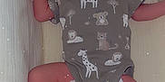 Kays participe au concours pour gagner de l'argent avec cette photo : baby, sleeping, onesie, animal_print, crib, infant, newborn, padded, cozy, soft, peaceful, resting, child, cute, diaper, foot, hand, face, indoors, portrait