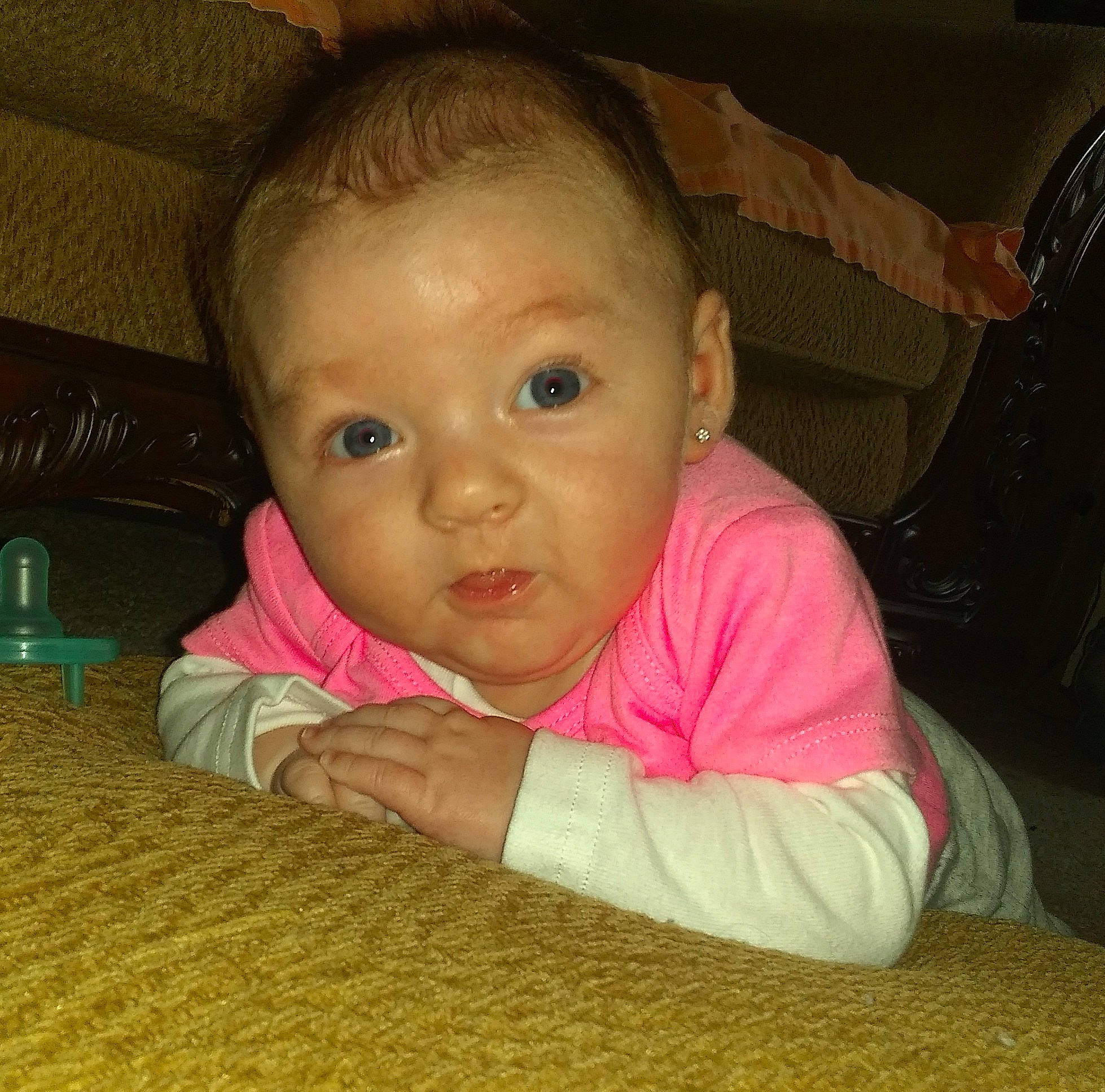 Kylah is registered to the contest to win money with this photo: baby, cheek, child, chin, eye, eyebrow, face, finger, forehead, fun, head, iris, lip, mouth, nose, person, sitting, skin, smile, toddler