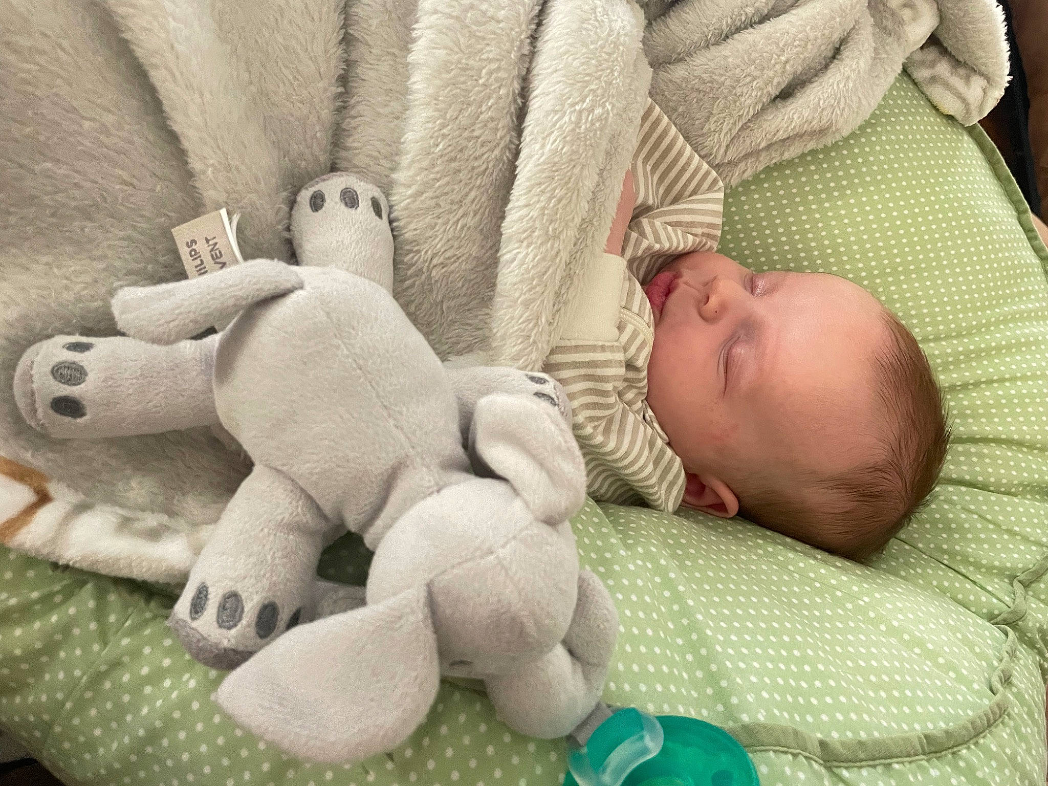 Kasin is registered to the contest to win money with this photo: baby, baby_products, baby_sleeping, baby_toddler_clothing, bedtime, child, comfort, finger, hand, head, linens, mammal, person, plush, room, skin, stuffed_toy, textile, toddler, toy
