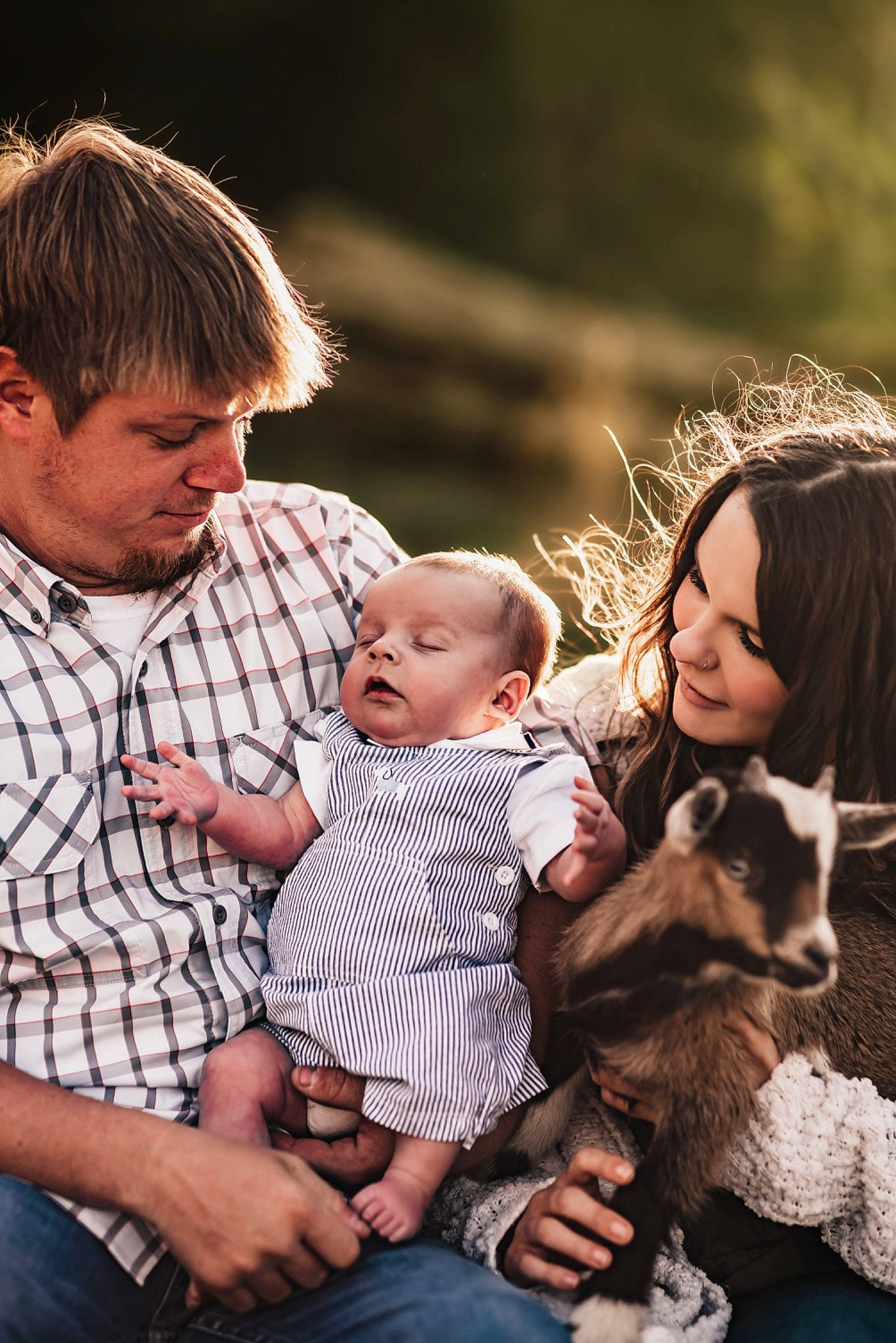 Kasin is registered to the contest to win money with this photo: baby, child, companion_dog, event, family, flash_photography, fun, fur, grass, hand, happy, joy, love, people_in_nature, person, plant, portrait_photography, sitting, skin, smile