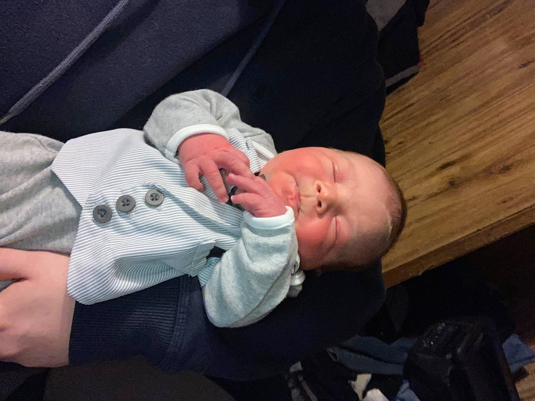 Haiden joined the competition — help win amazing prizes! baby, baby_carriage, baby_products, baby_toddler_clothing, child, comfort, finger, gesture, hand, hat, lap, nail, nap, person, sitting, sleep, thumb, toddler, tree, wood