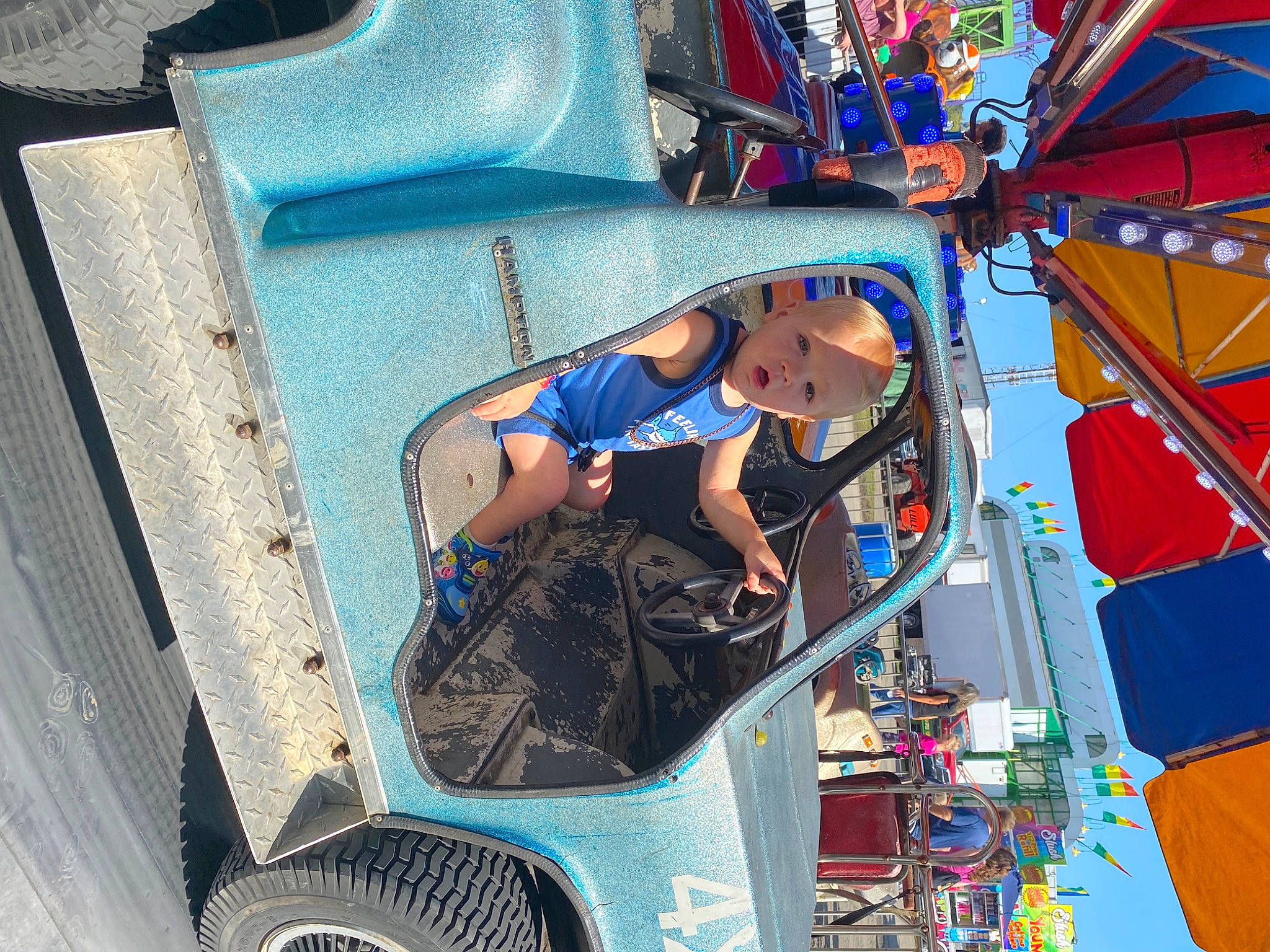 Haiden joined the competition — help win amazing prizes! auto_part, automotive_design, automotive_exterior, automotive_tire, automotive_wheel_system, bumper, electric_blue, event, fun, leisure, motor_vehicle, person, recreation, shorts, sunglasses, t_shirt, thigh, tire, travel, vehicle_door