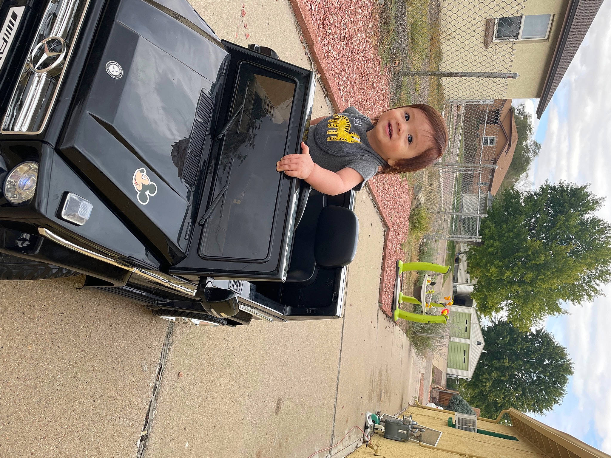 Uriah joined the competition — help win amazing prizes! asphalt, automotive_design, automotive_exterior, automotive_lighting, automotive_tire, automotive_wheel_system, bumper, car, fender, hood, joy, motor_vehicle, person, plant, rolling, sky, tire, tree, vehicle, vehicle_door