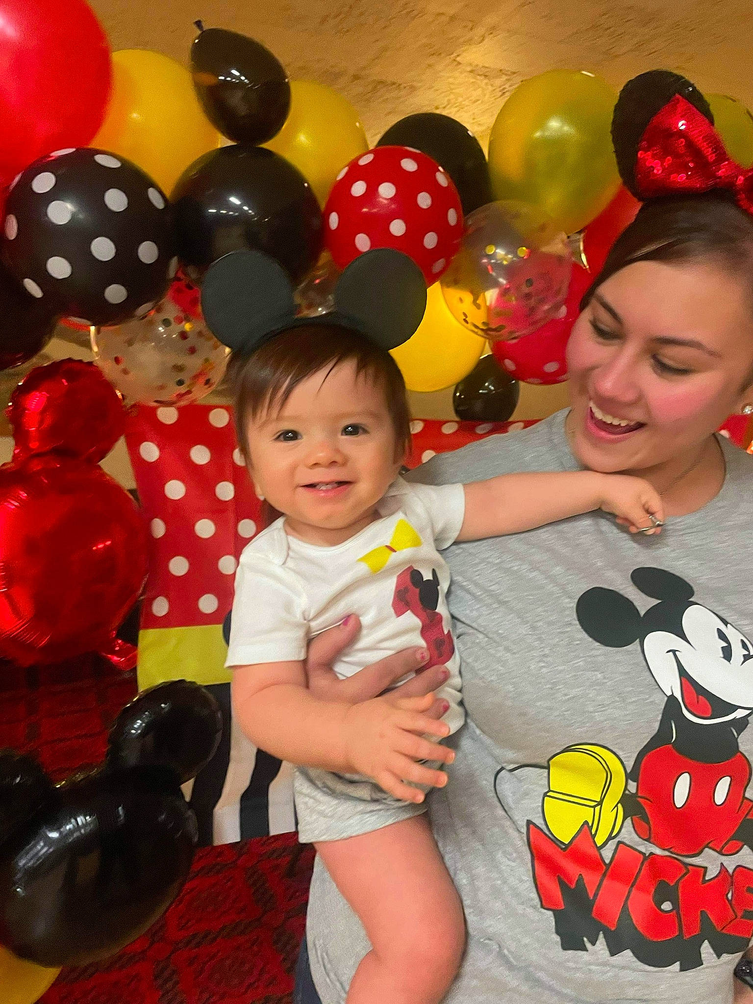 Uriah is registered to the contest to win money with this photo: balloon, child, event, facial_expression, fun, happy, human_leg, joy, leisure, mammal, organ, party, party_supply, person, pink, recreation, red, shorts, smile, social_group