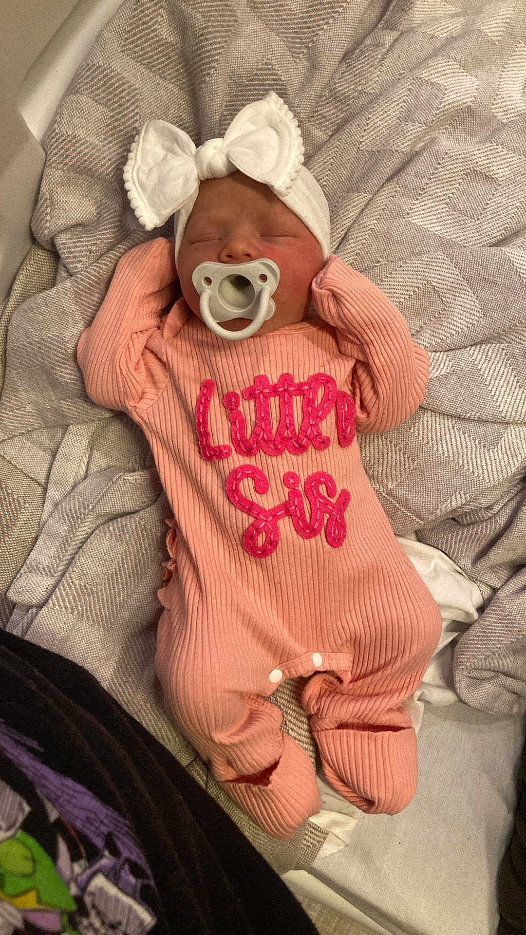 Harper is registered to the contest to win money with this photo: newborn, baby, sleeping, pacifier, headband, pink_onesie, little_sis, blanket, soft_texture, infant, cute, cozy, child, toddler, clothing, bed, resting, indoors, portrait, peaceful