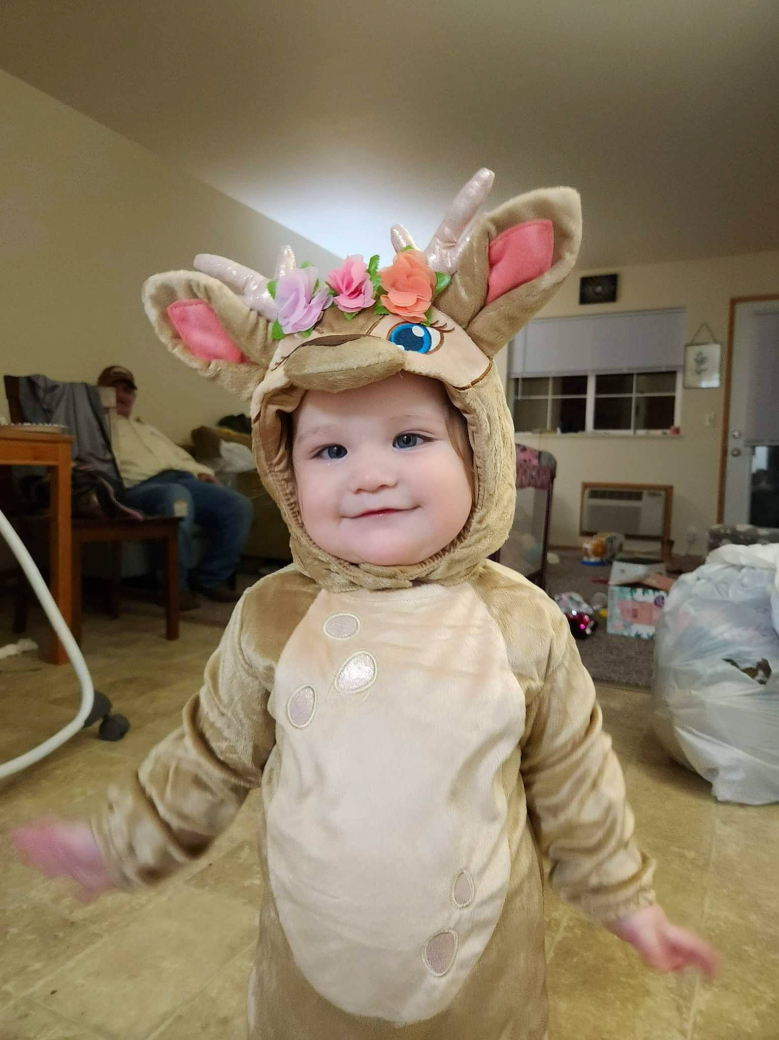 Mayah is registered to the contest to win money with this photo: antler, baby_toddler_clothing, chair, child, costume, costume_hat, event, fashion_accessory, fawn, fun, fur, hair_accessory, happy, headgear, headwear, holiday, joy, party_supply, person, sleeve