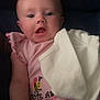 Sophia joined the competition — help win amazing prizes! baby, infant, pink_clothing, bee_design, white_cloth, laying_down, curious_expression, indoor, child, cute, soft_lighting, pastel_colors, person, young_child, face, small_hand, sleepwear, fabric, blanket, portrait