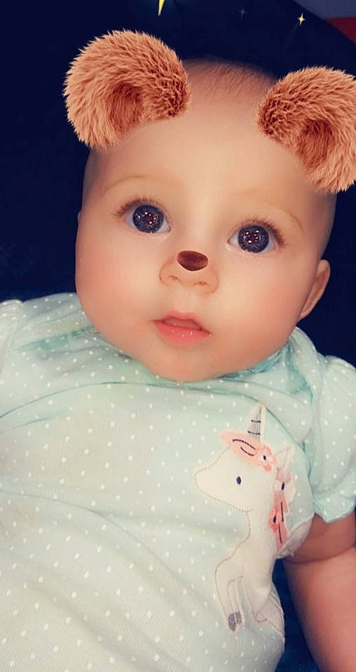 Edith is registered to the contest to win money with this photo: baby, blond, brown_hair, cheek, child, doll, ear, eye, eyebrow, eyelash, face, forehead, head, iris, lip, nose, person, pink, skin, toddler