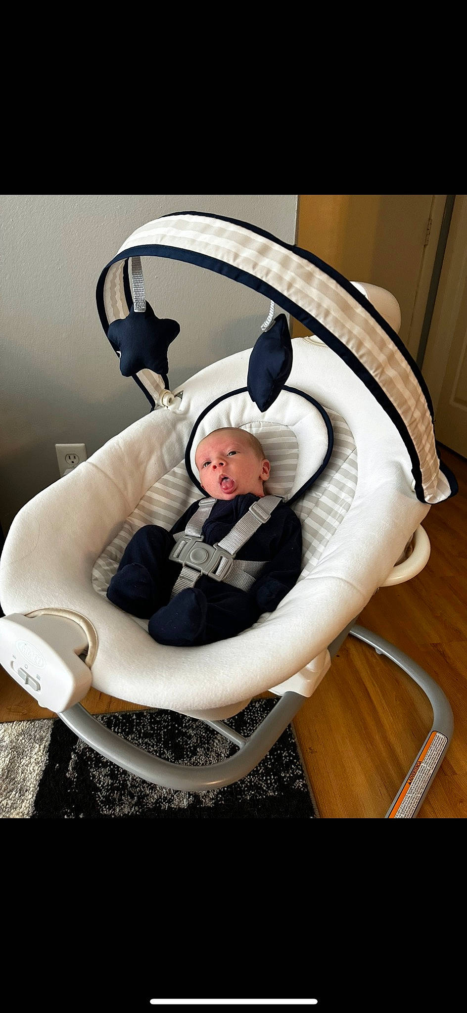 Jalen is registered to the contest to win money with this photo: audio_equipment, automotive_design, baby, baby_products, chair, child, circle, comfort, costume, eyewear, flash_photography, fun, fur, furniture, happy, person, personal_protective_equipment, sitting, toddler