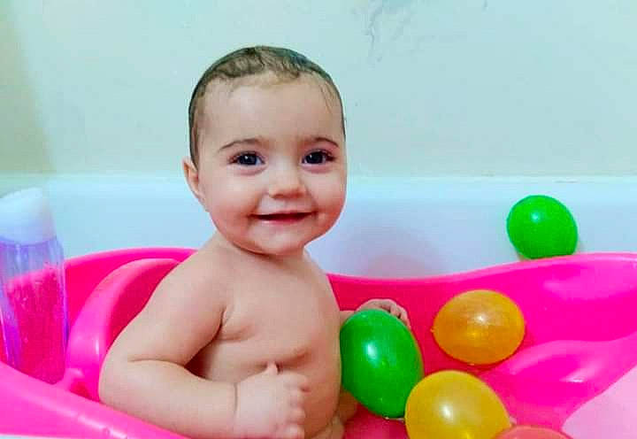 Natalie joined the competition — help win amazing prizes! baby, baby_bathing, baby_playing_with_toys, baby_products, balloon, bath_toy, bathing, bathtub, child, event, fun, happy, joy, leisure, person, pink, play, plumbing, recreation, smile