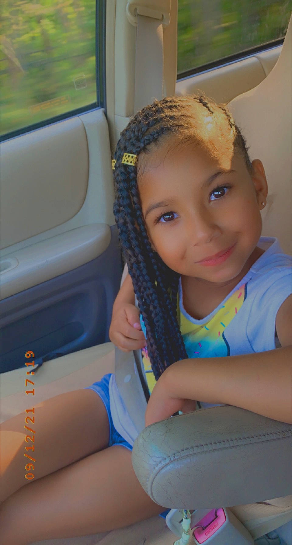 Janelle joined the competition — help win amazing prizes! black_hair, blond, car_seat, car_seat_cover, electric_blue, face, finger, fun, happy, head, head_restraint, iris, joy, leisure, long_hair, neck, nose, person, smile, thigh