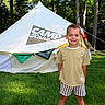 Kane joined the competition — help win amazing prizes! child, boy, smiling, outdoor, camping, tent, forest, trees, grass, summer, sunlight, portrait, barefoot, shorts, t_shirt, nature, backyard, campground, happy, camping_gear