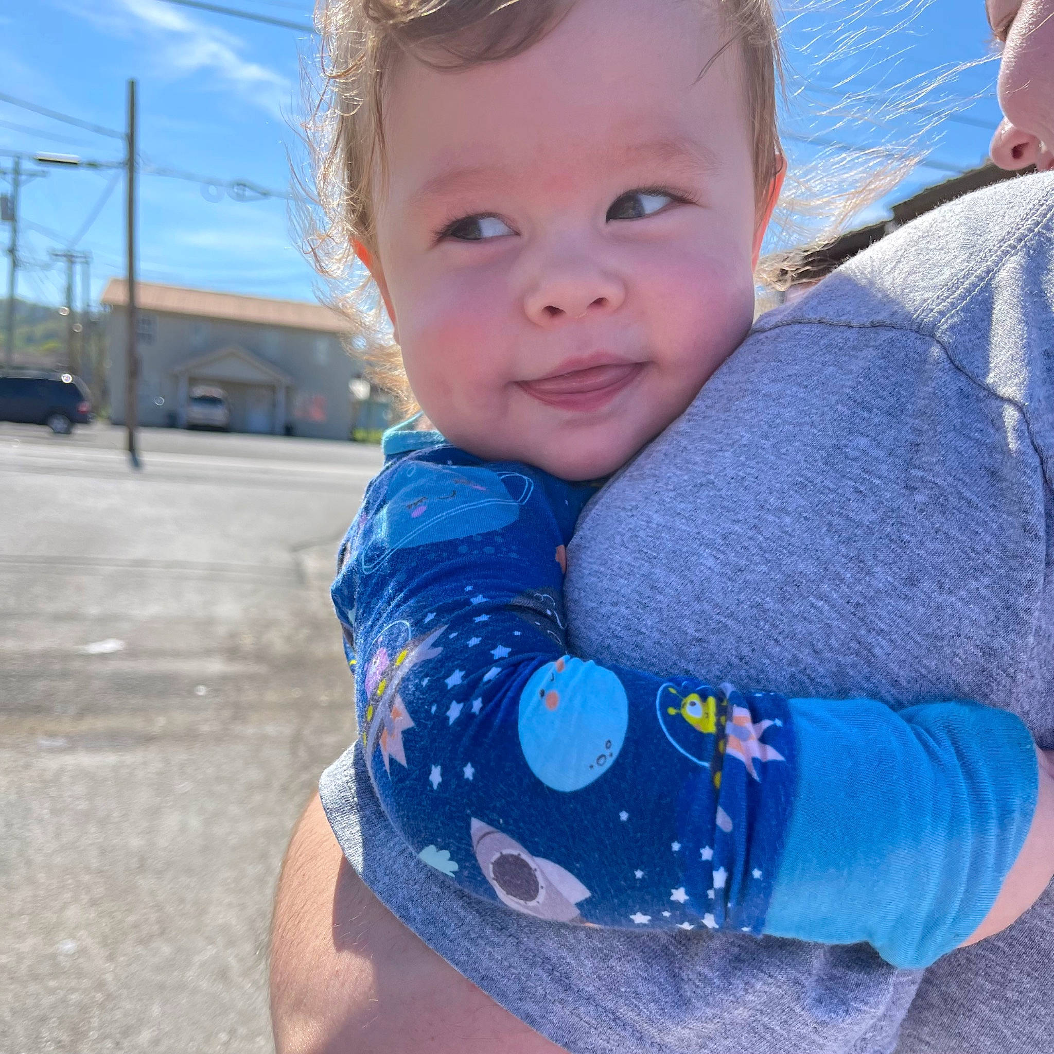 Miller joined the competition — help win amazing prizes! azure, baby_toddler_clothing, blue, child, electric_blue, fun, grass, happy, human_body, iris, joint, leisure, nose, person, sitting, skin, sky, sleeve, smile, toddler