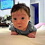Brisa joined the competition — help win amazing prizes! baby, infant, tummy_time, curious, indoor, furniture, television, door, room, carpet, clothing, person, head, face, eyes, hands, skin, hair, expression, home