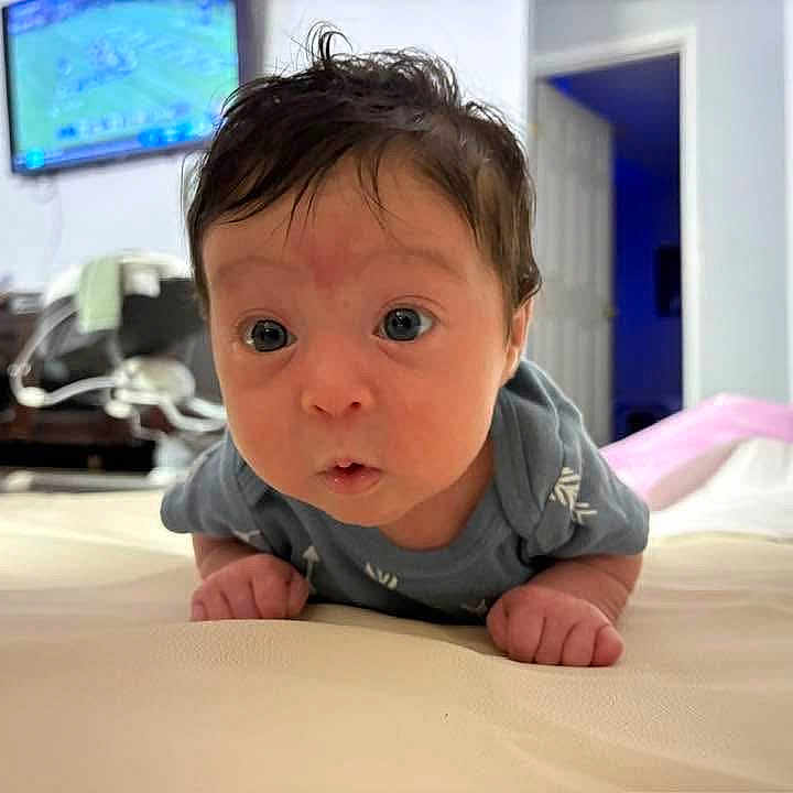 Brisa joined the competition — help win amazing prizes! baby, carpet, clothing, curious, door, expression, eyes, face, furniture, hair, hands, head, home, indoor, infant, person, room, skin, television, tummy_time