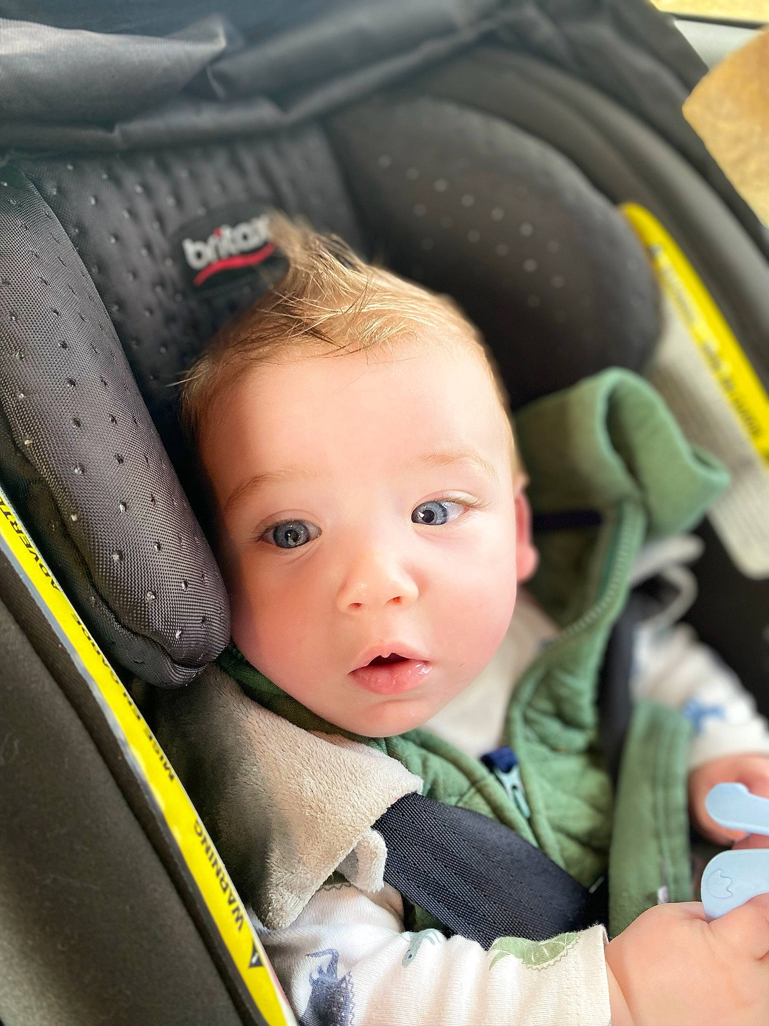 Brixton is registered to the contest to win money with this photo: auto_part, automotive_tire, automotive_wheel_system, baby, baby_carriage, baby_in_car_seat, baby_products, baby_safety, baby_toddler_clothing, beauty, black, car_seat, cheek, child, comfort, person, photograph, product, sitting, thumb