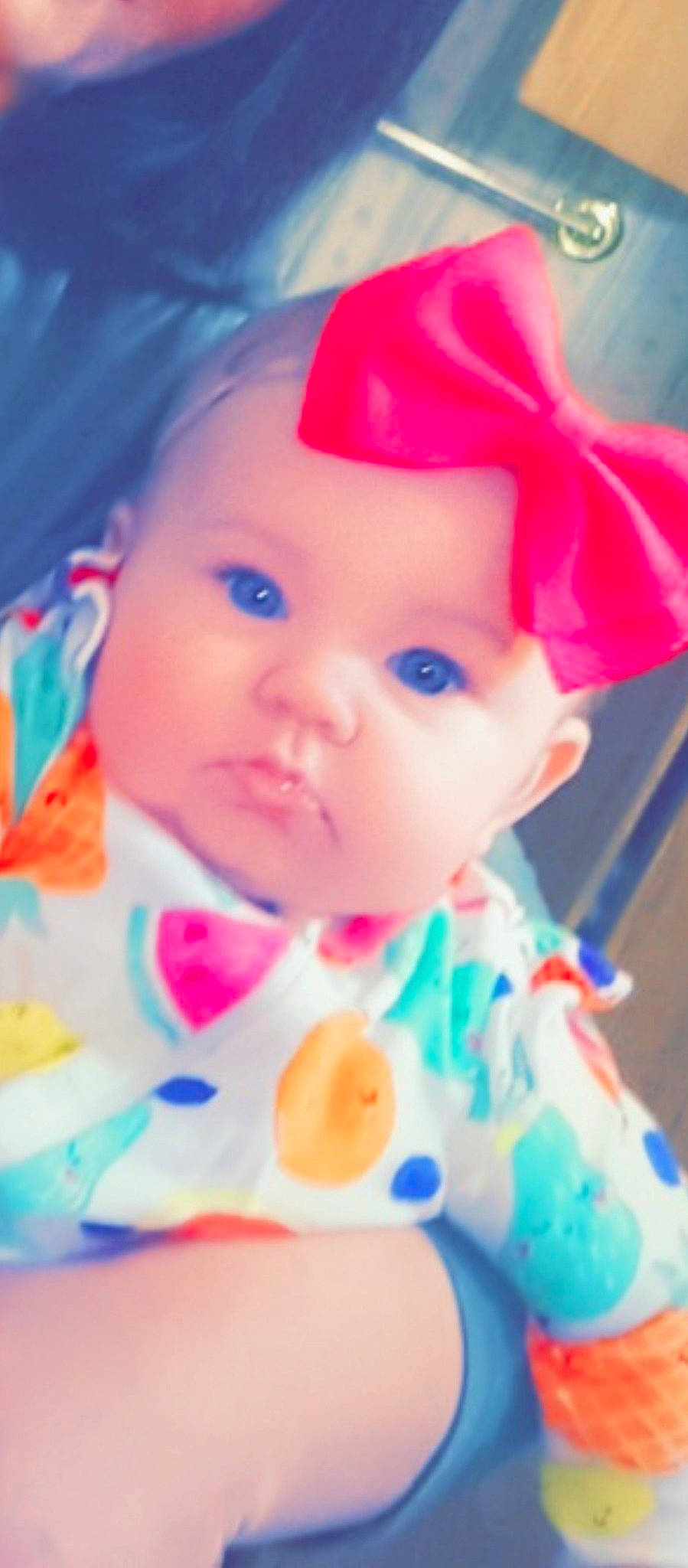 Macey is registered to the contest to win money with this photo: baby, baby_toddler_clothing, cap, cheek, child, chin, dress, fun, happy, hat, headgear, iris, lip, nose, orange, person, pink, skin, sleeve, textile