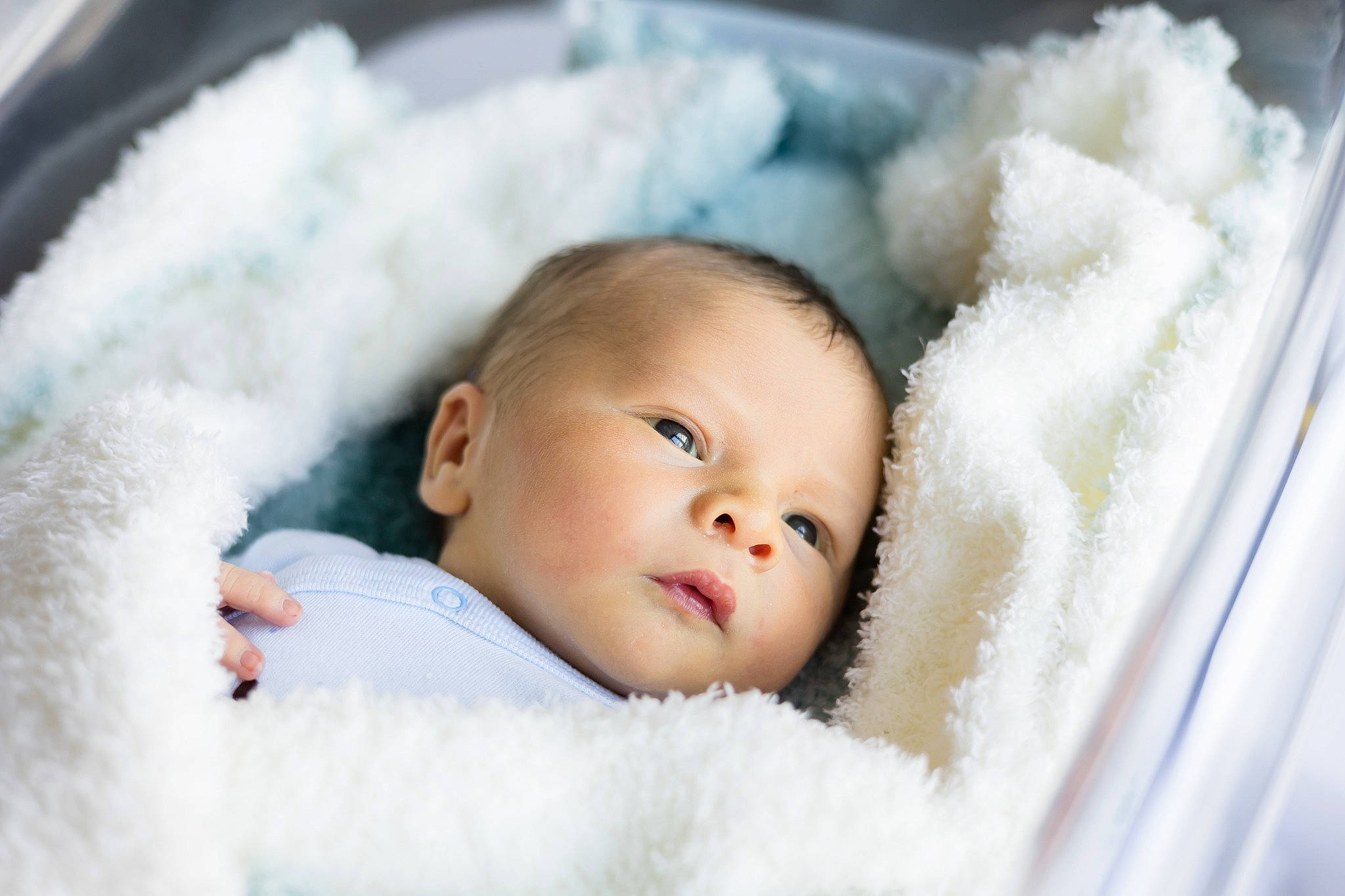 River is registered to the contest to win money with this photo: baby, baby_toddler_clothing, cheek, comfort, eye, eyebrow, eyelash, face, flash_photography, freezing, fur, happy, head, iris, linens, nose, person, portrait_photography, toddler, winter