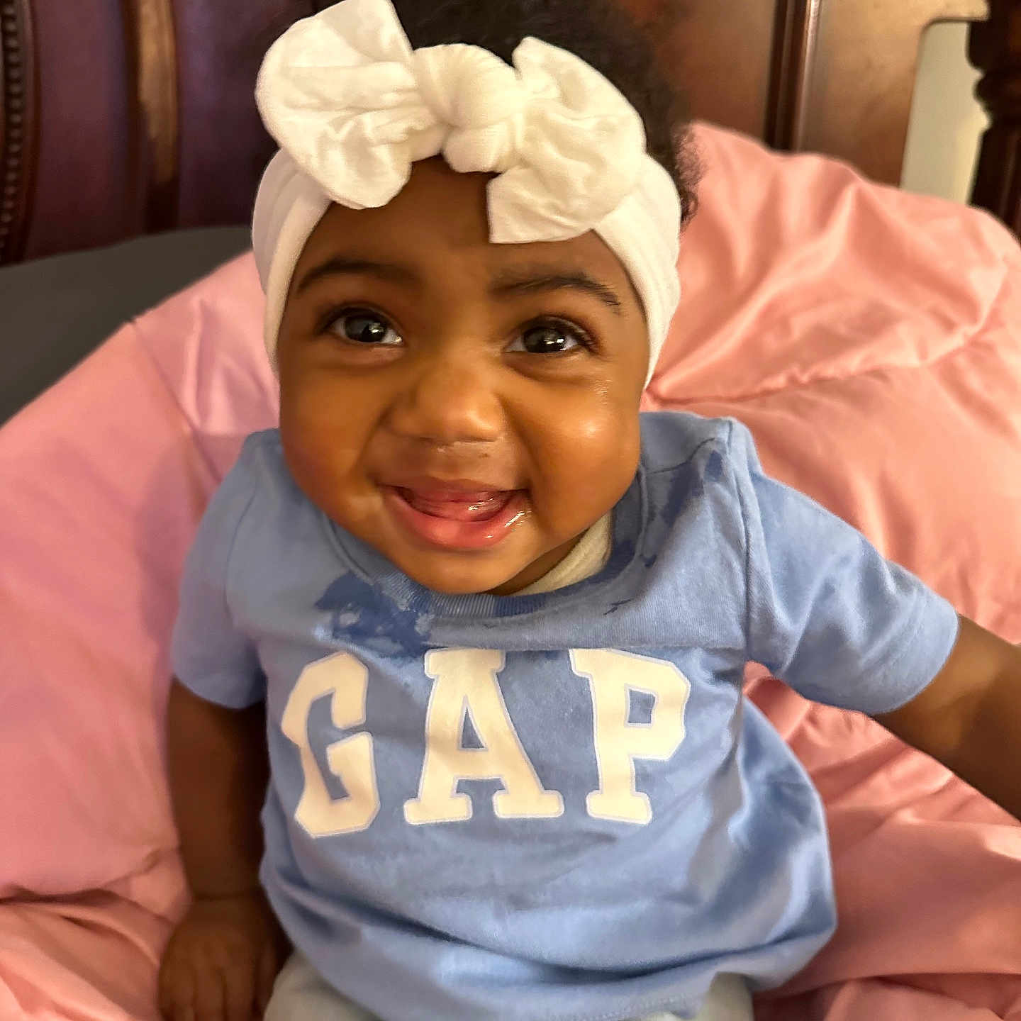 Kennedy joined the competition — help win amazing prizes! accessories, baby, babylaughing, cap, clothing, couch, cushion, face, furniture, happy, hat, head, headband, homedecor, indoors, pants, person, photography, portrait, smile