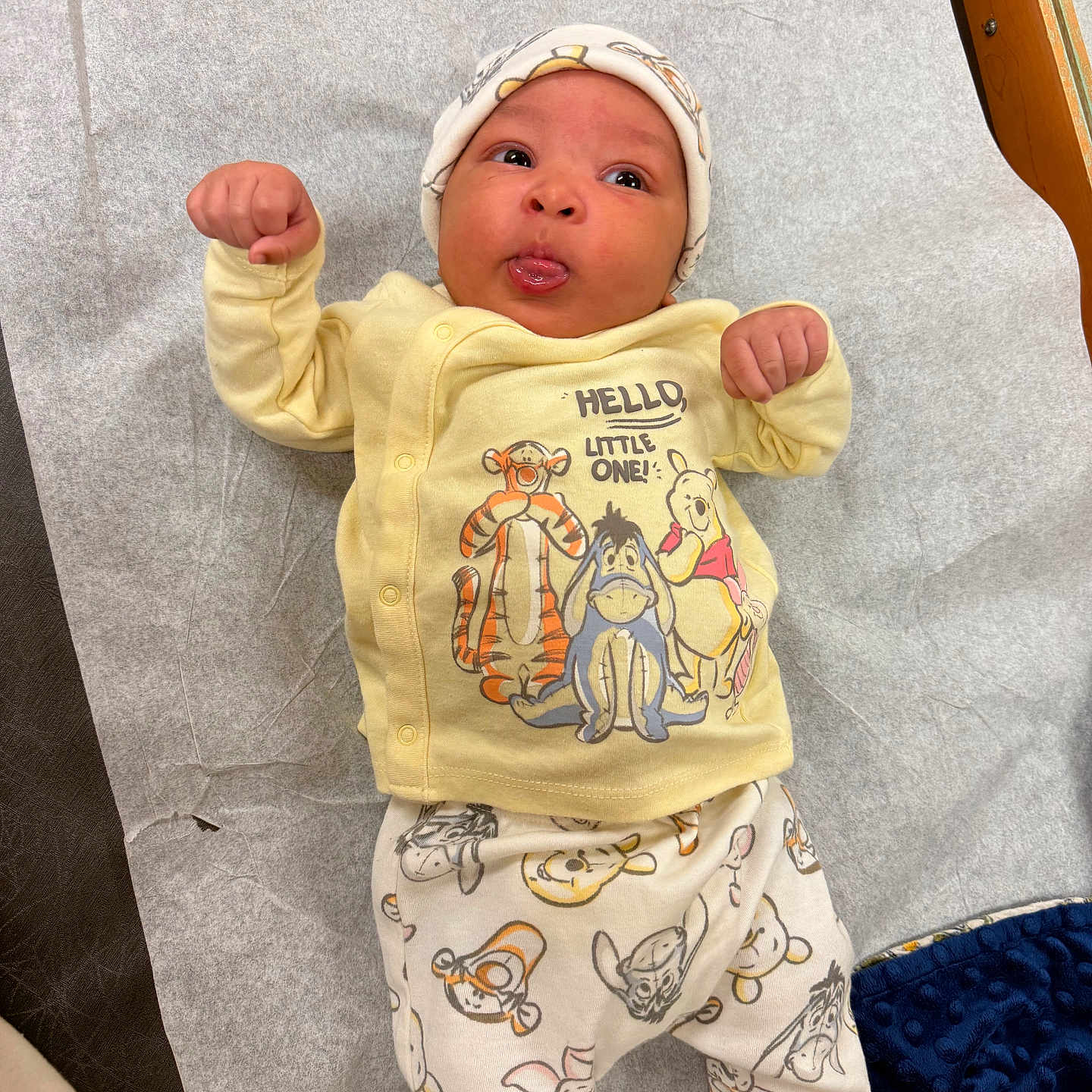 Zenekai is registered to the contest to win money with this photo: applique, baby, bed, bodypart, bonnet, cap, clothing, face, finger, furniture, glove, hand, hat, head, newborn, pants, person, photography, portrait, shorts