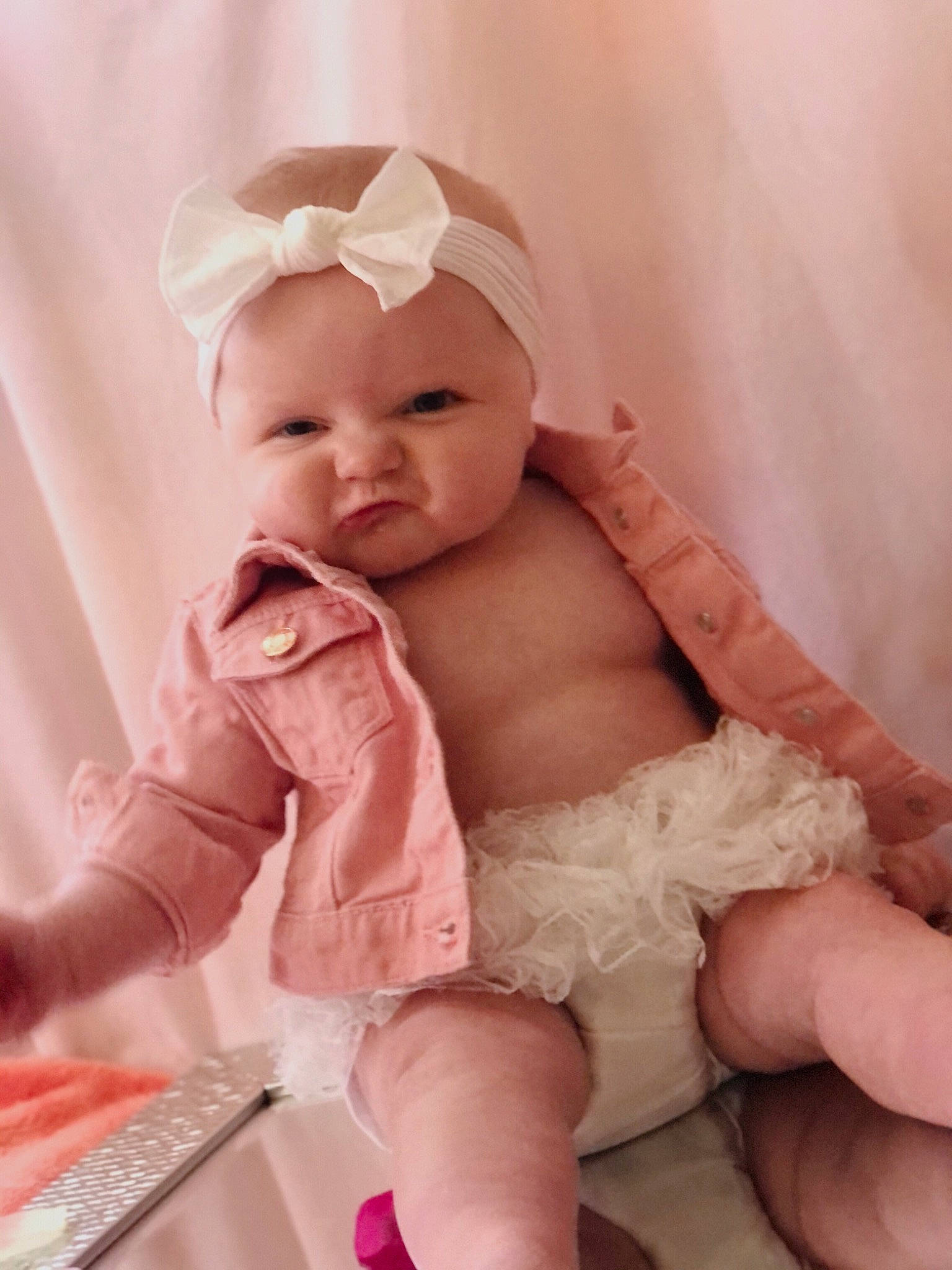 Chelsea joined the competition — help win amazing prizes! baby, baby_products, baby_sleeping, baby_toddler_clothing, cheek, child, comfort, face, facial_expression, fashion_accessory, finger, hand, happy, headwear, peach, person, pink, skin, smile, stomach