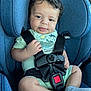 baby, car_seat, child, infant, seatbelt, clothing, onesie, socks, cute, smiling, curly_hair, car_interior, blue, safety, harness, closeup, portrait, young_child, seat, relaxing