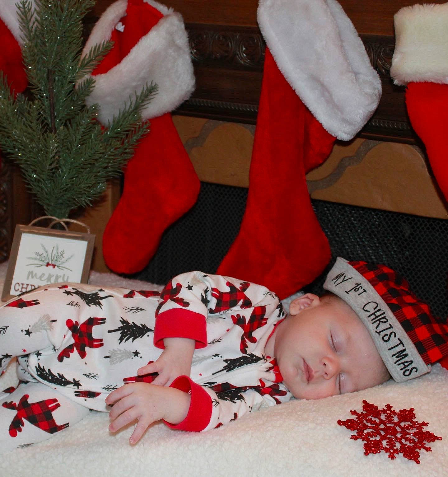 Bently joined the competition — help win amazing prizes! arm, baby, baby_sleeping, baby_toddler_clothing, child, christmas, christmas_eve, comfort, event, happy, headwear, holiday, lap, linens, mammal, person, red, room, sock, textile