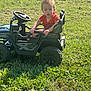 Noah joined the competition — help win amazing prizes! child, grass, toy_car, outdoor, sunlight, greenery, vehicle, kid, playing, summer, nature, casual, portrait, daytime, young, curious, sitting, fun, happy, leisure