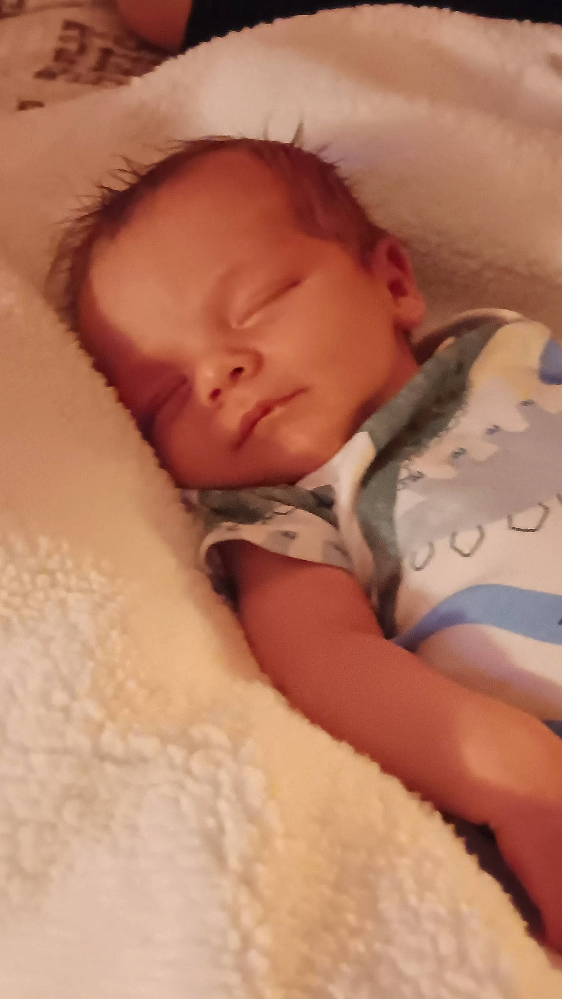 Lucien is registered to the contest to win money with this photo: abdomen, baby, baby_sleeping, bed, bed_sheet, bedding, bedtime, cheek, child, comfort, eyebrow, happy, iris, linens, mouth, nap, nose, person, room, skin