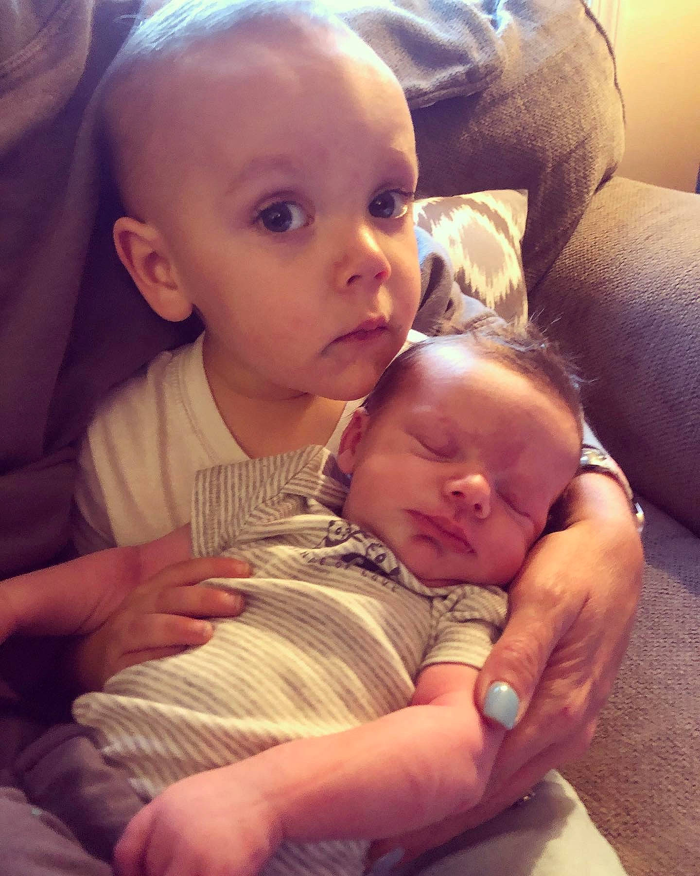 Cian is registered to the contest to win money with this photo: baby, cheek, child, ear, eye, face, finger, happy, head, human, lap, nose, person, skin, smile, thumb, toddler