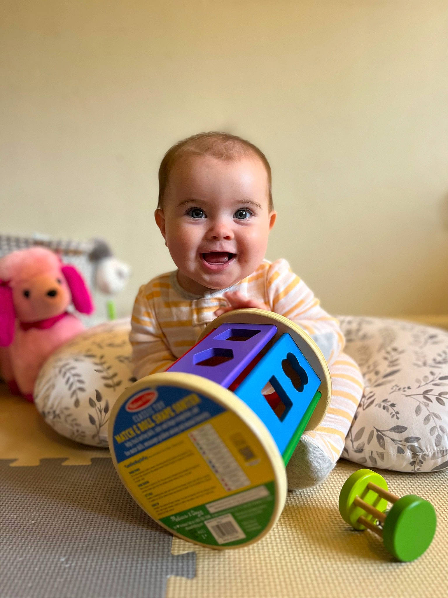 Matilda joined the competition — help win amazing prizes! baby, baby_playing_with_toys, baby_products, baby_toddler_clothing, baby_toys, child, flooring, happy, head, joy, person, play, product, room, sitting, skin, smile, stuffed_toy, thumb, toddler