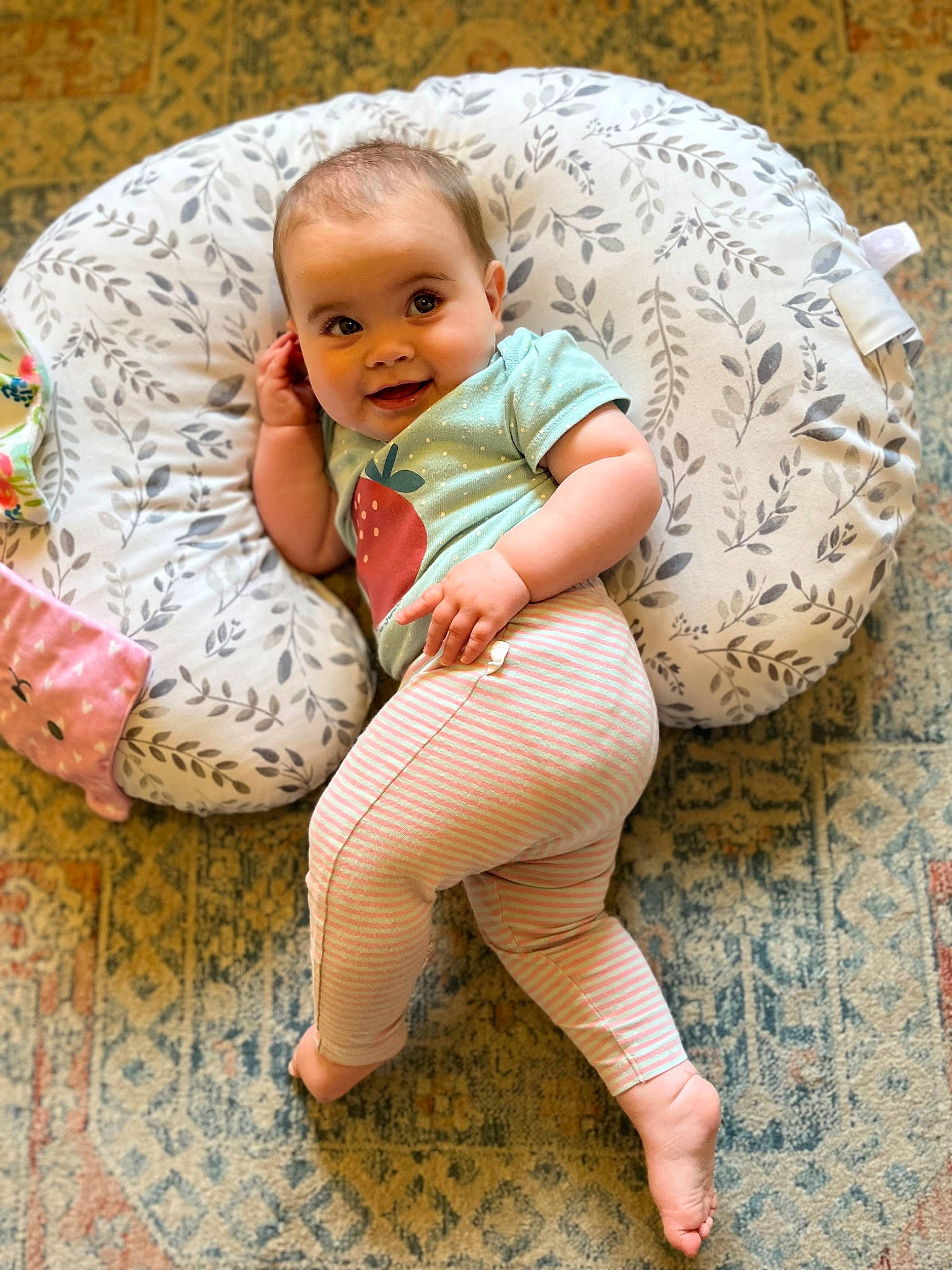 Matilda joined the competition — help win amazing prizes! arm, baby, baby_toddler_clothing, barefoot, child, comfort, eye, finger, floor, flooring, foot, joy, knee, mammal, person, skin, sleeve, smile, sock, thigh
